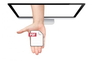 Open hand extending from computer screen with PDF file.