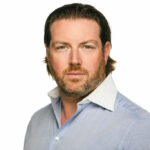 Headshot of Adam Spencer