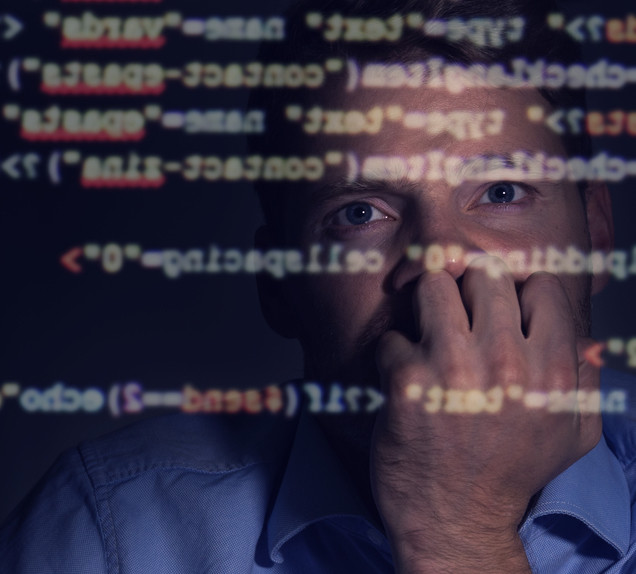 Developer examines code.