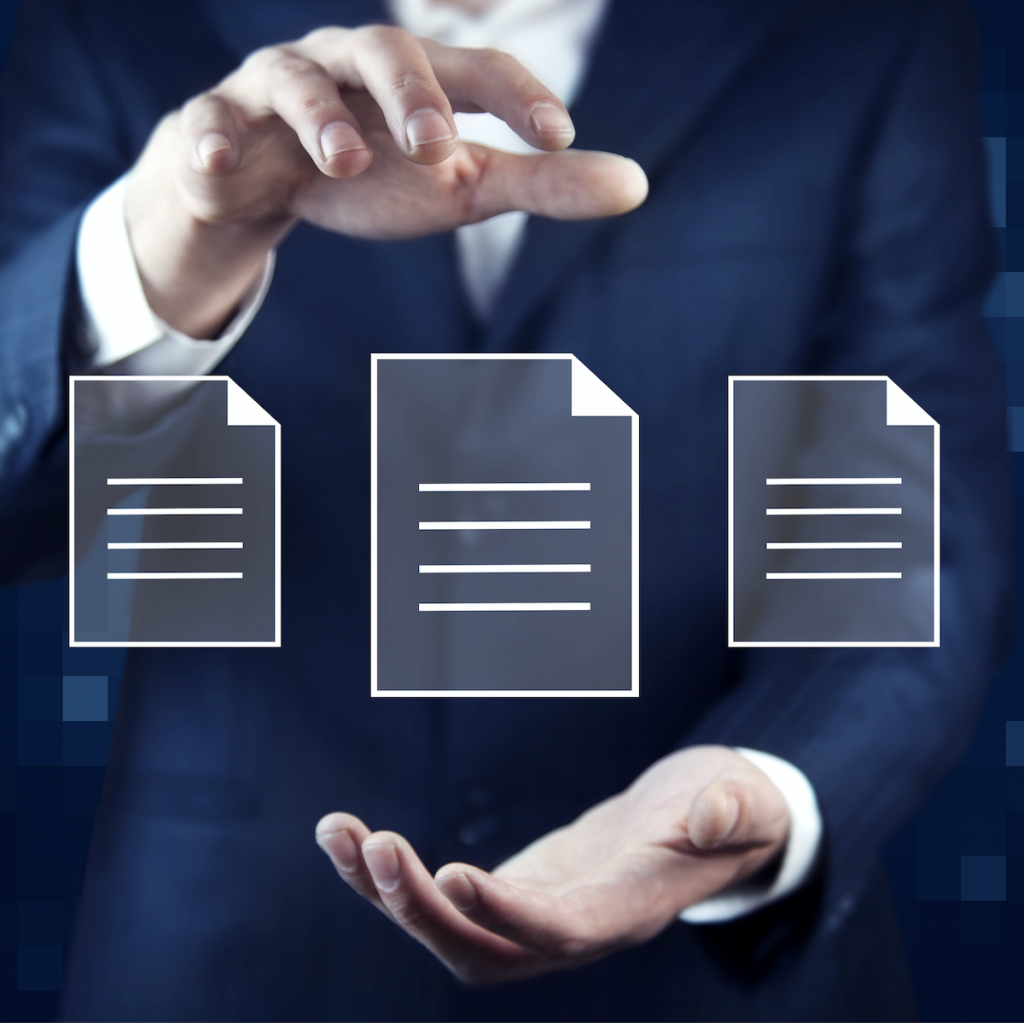 Hands holding documents