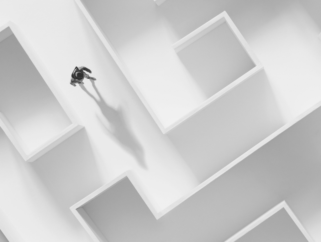 Man walking through a maze