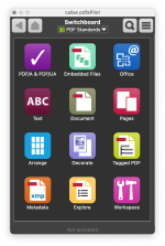 Photo of a mobile phone home page showing numerous application icons