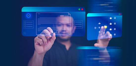 man writing on computer screen and selecting applications on a screen